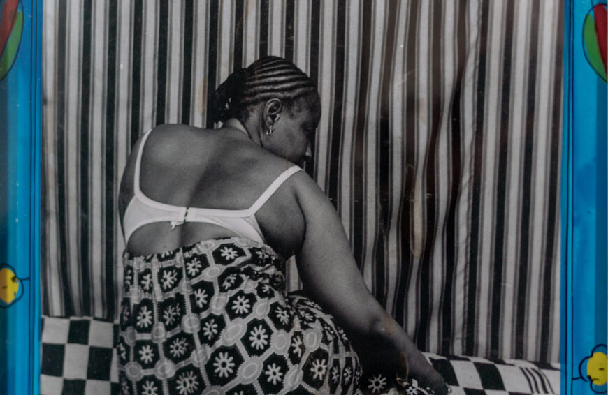 Malick Sidibé, Vues de dos, print 2003, frame 2004, gelatin silver print, glass, paint, cardboard, tape, and string, 36.5 x 27 cm (The J. Paul Getty Museum, Los Angeles) © Malick Sidibé